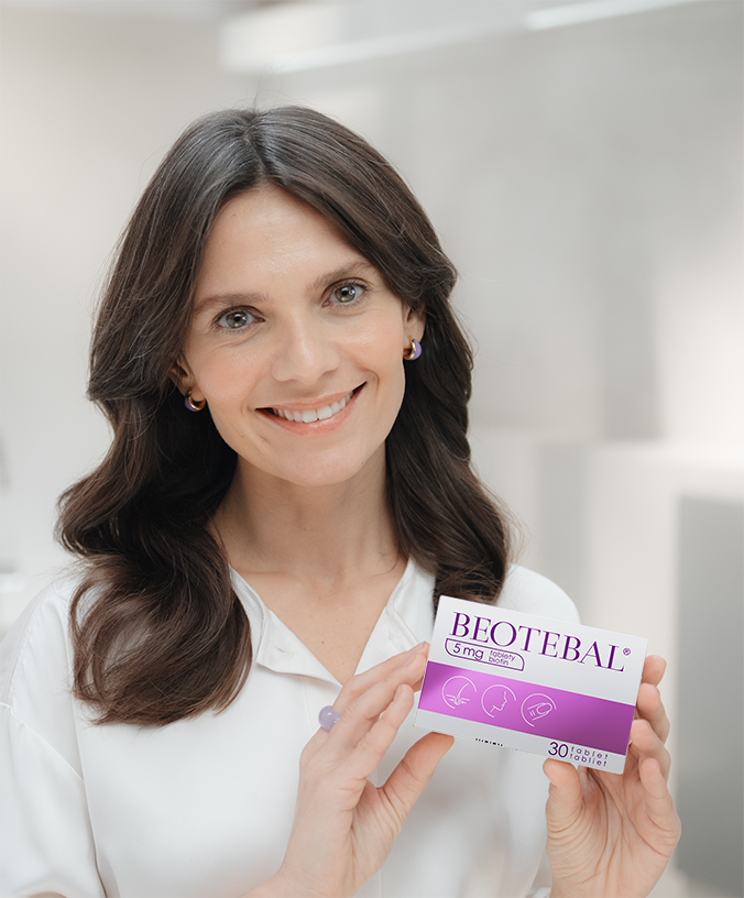 Smiling woman holding Beotebal packshot